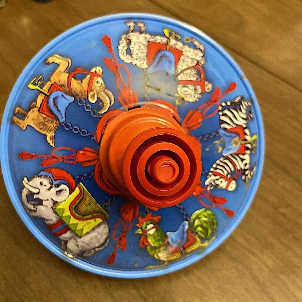 Vintage SMG Metal Spin Toy Top With Animal Cartoon Graphics In Red And Blue. - Picture 1 of 7